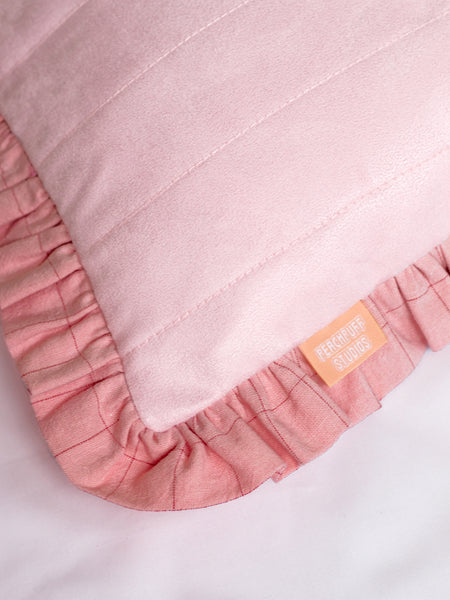 A close-up of a pink ruffle cushion cover shows the suede texture and stitching details.